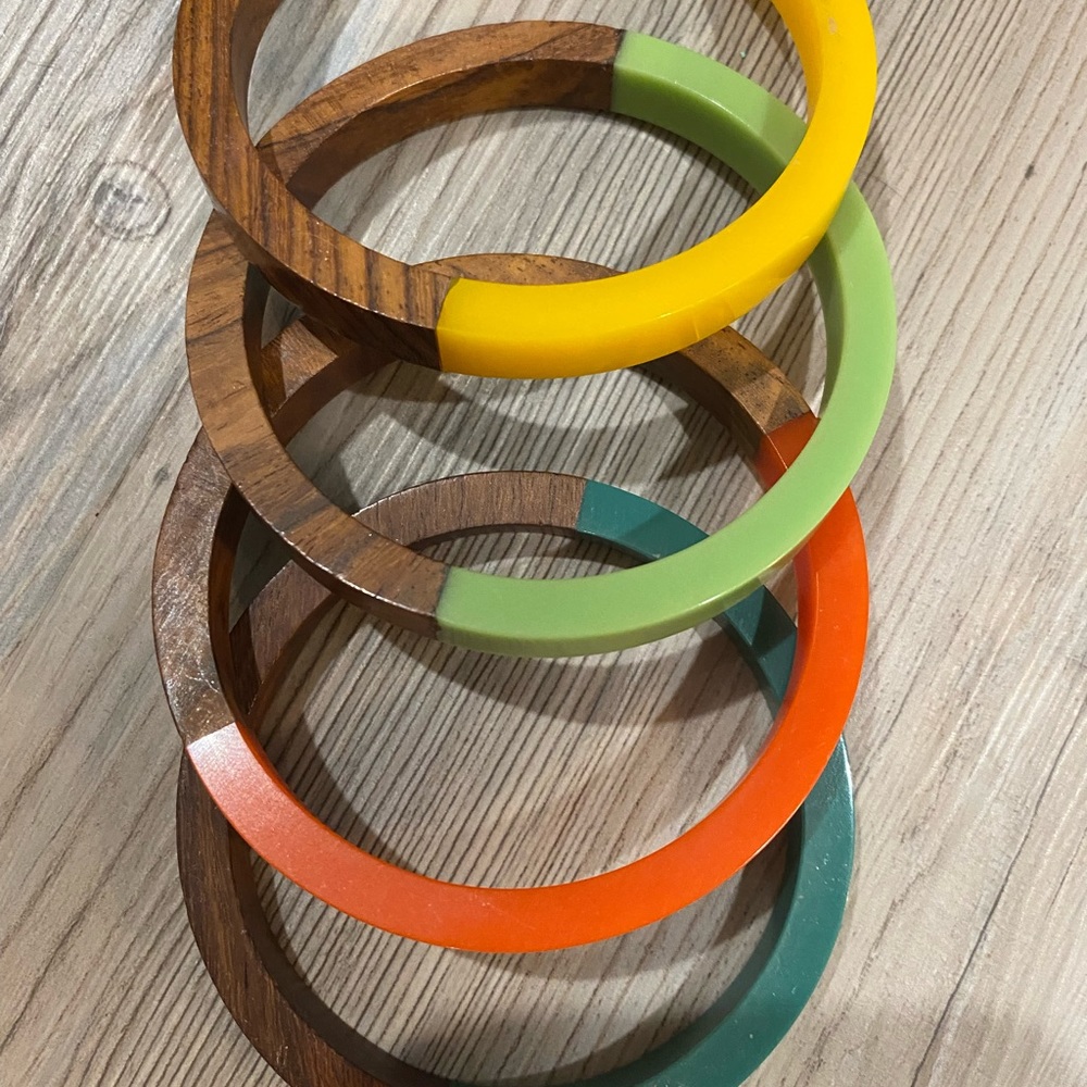 Teak and acrylic fall color bracelet set of four sold together.